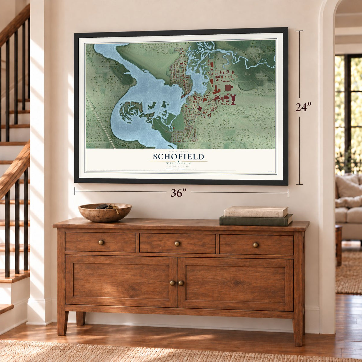 Schofield, Wisconsin map, 24 x 36 inch print in a black frame above a dresser by a staircase