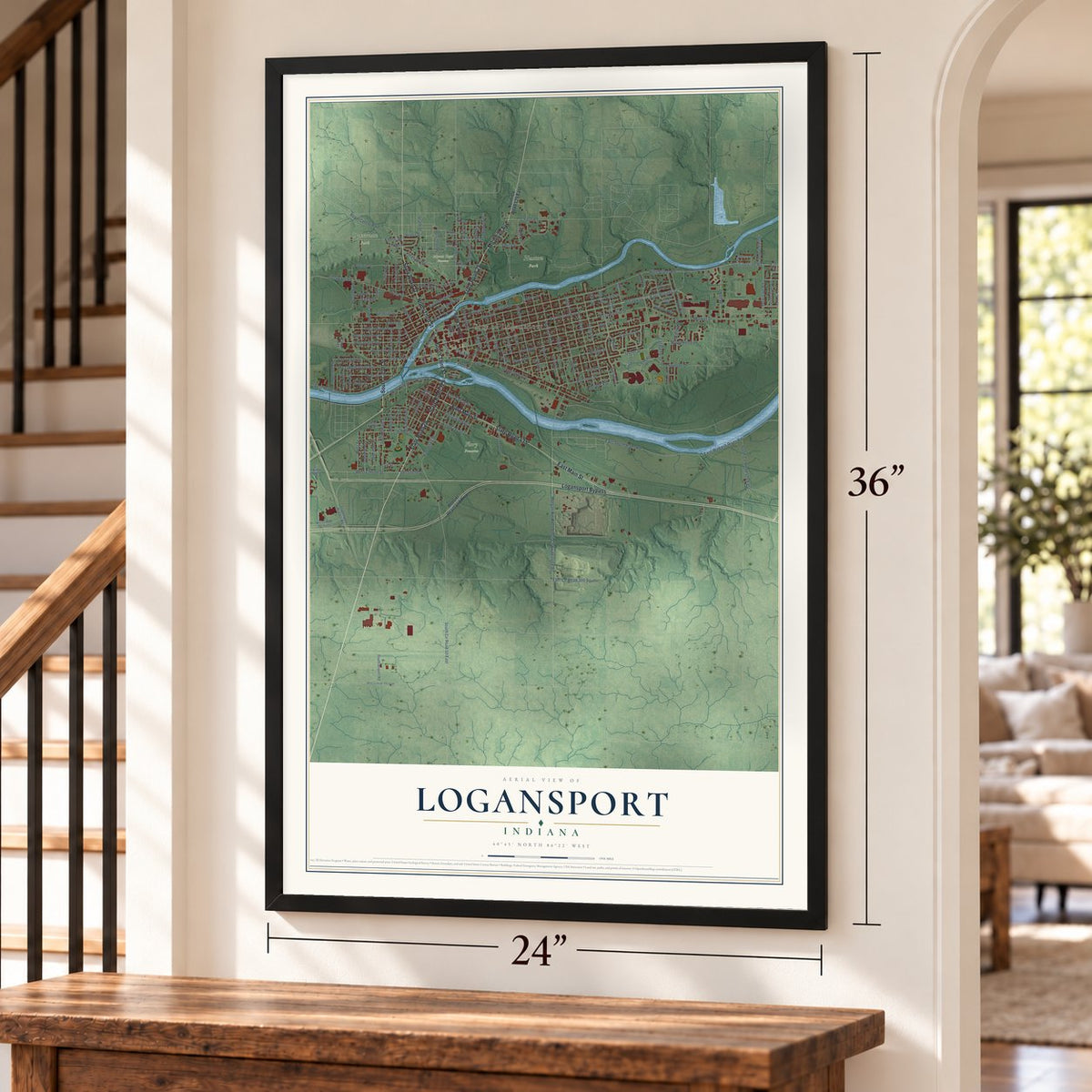 Logansport, Indiana map, 24 x 36 inch print in a black frame by a staircase