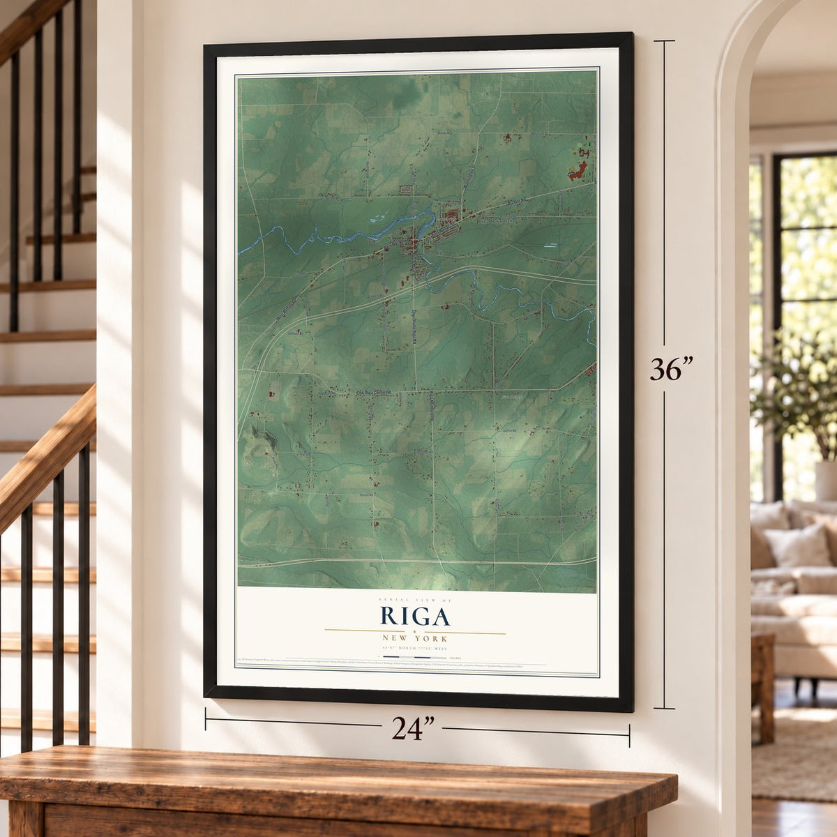 Riga, New York map, 24 x 36 inch print in a black frame by a staircase