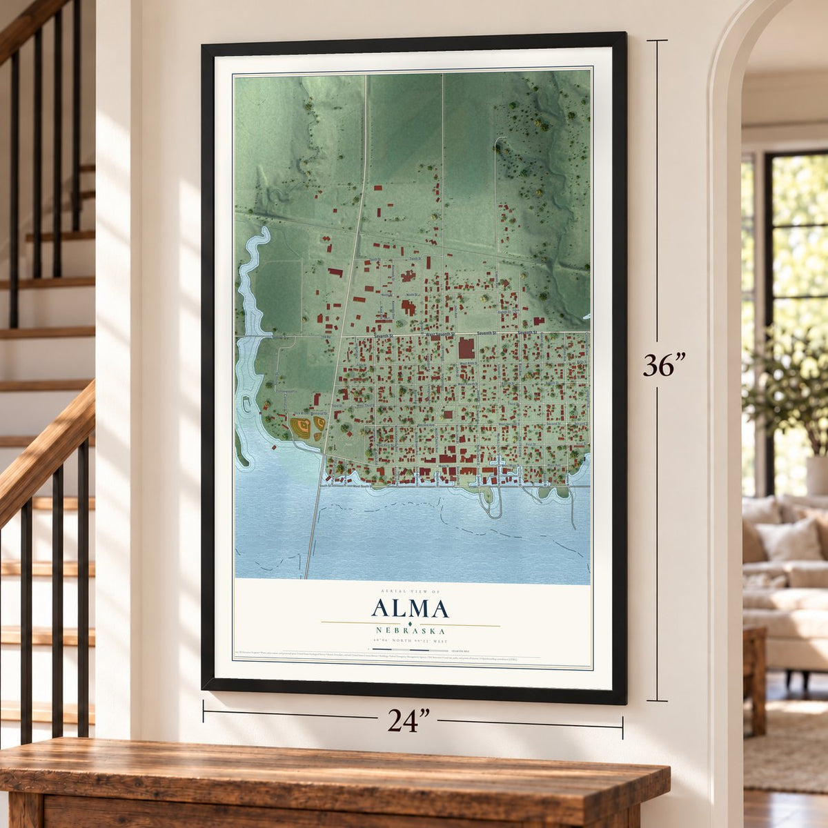 Alma, Nebraska map, 24 x 36 inch print in a black frame by a staircase
