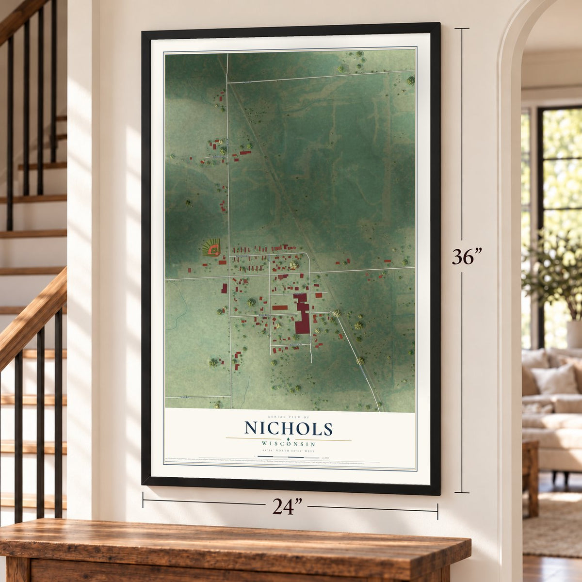 Nichols, Wisconsin map, 24 x 36 inch print in a black frame by a staircase