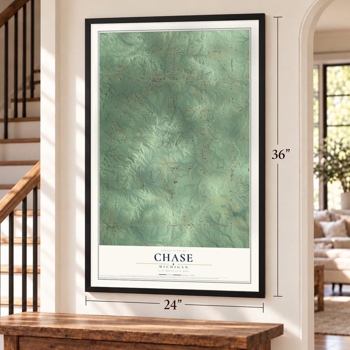 Chase, Michigan map, 24 x 36 inch print in a black frame by a staircase