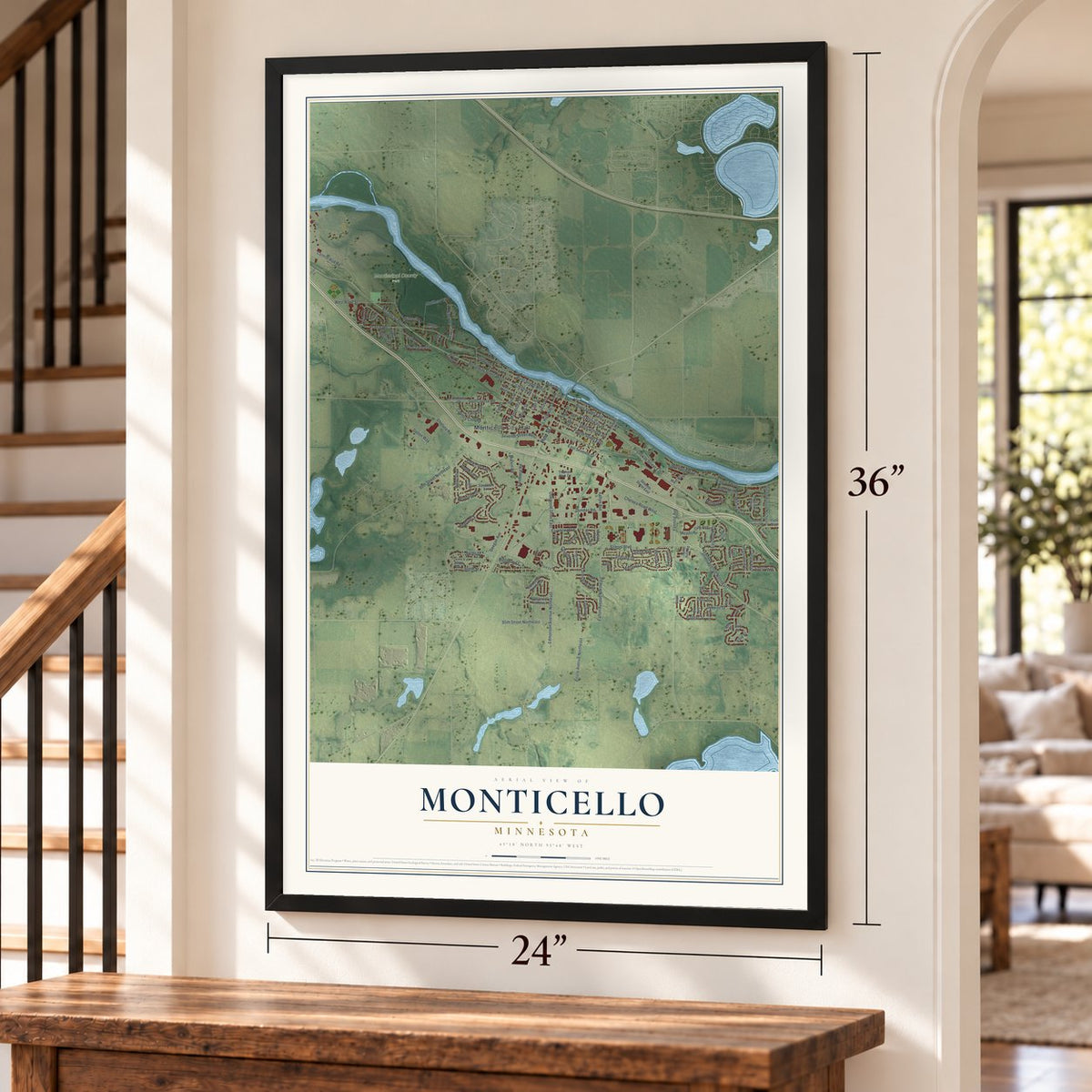 Monticello, Minnesota map, 24 x 36 inch print in a black frame by a staircase