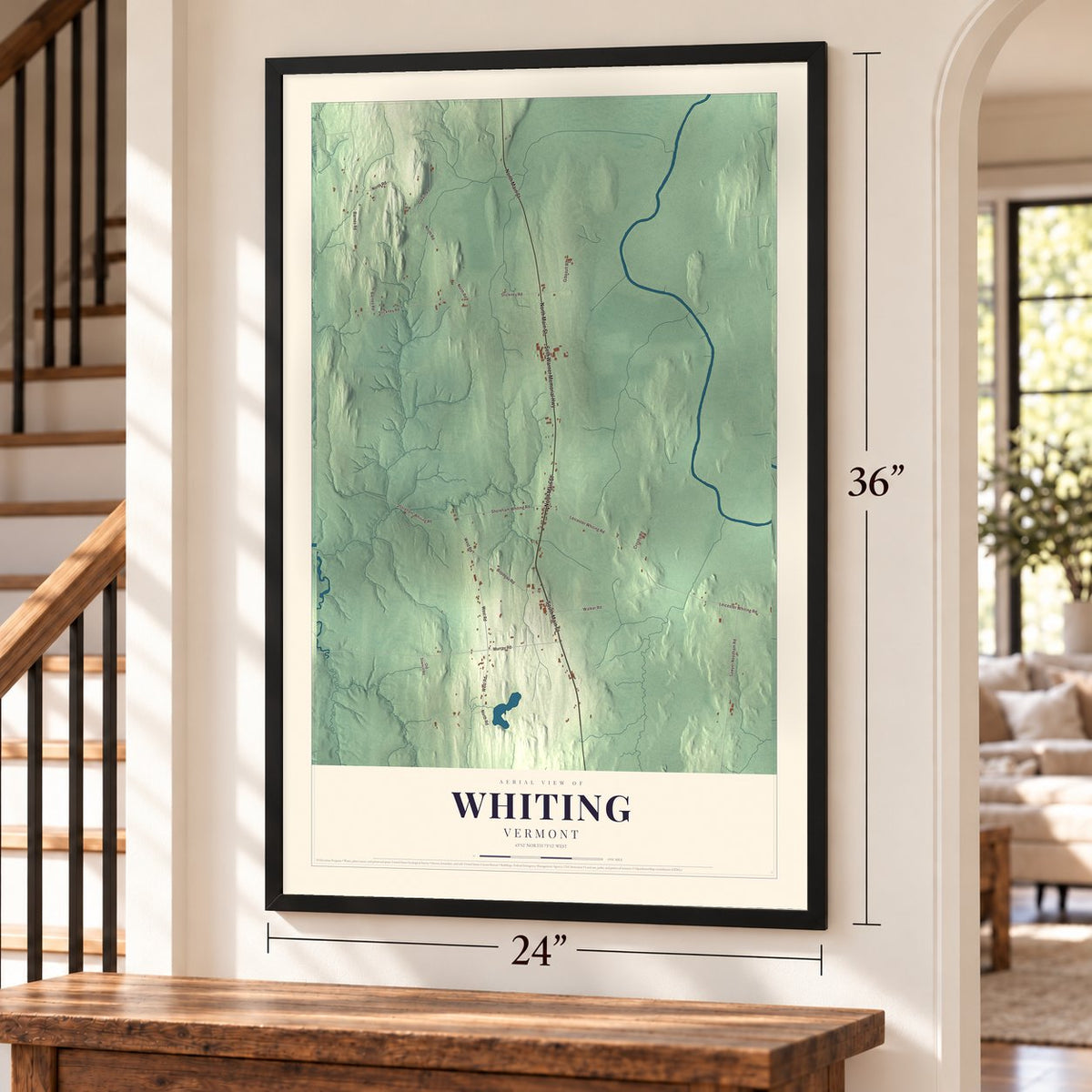 Whiting, Vermont map, 24 x 36 inch print in a black frame by a staircase
