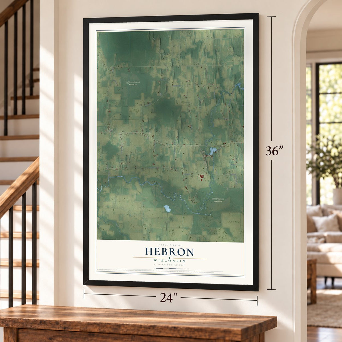 Hebron, Wisconsin map, 24 x 36 inch print in a black frame by a staircase