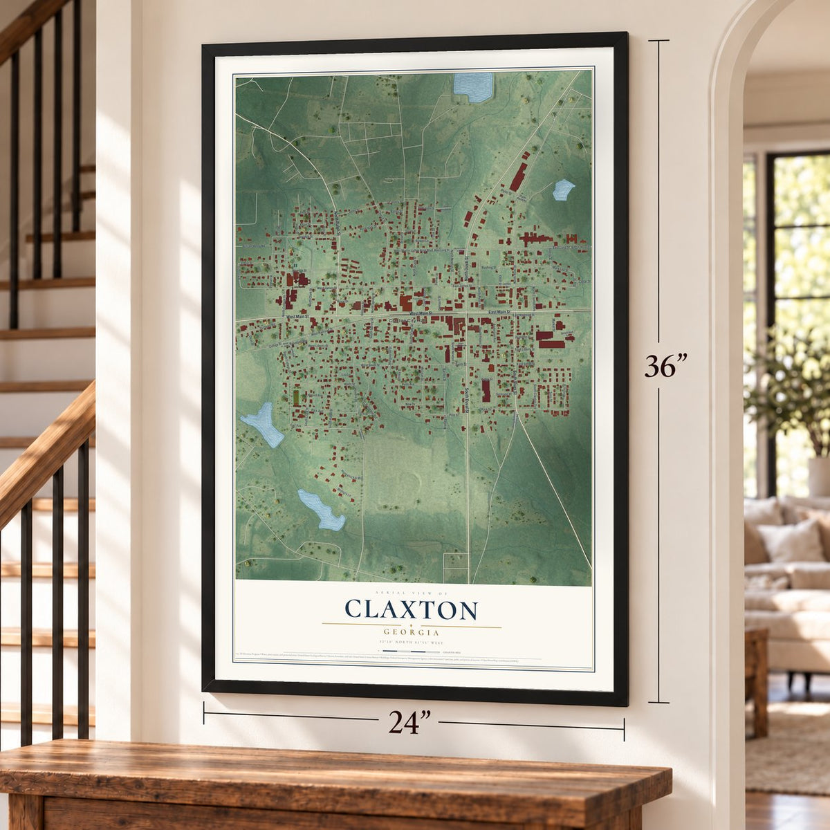 Claxton, Georgia map, 24 x 36 inch print in a black frame by a staircase