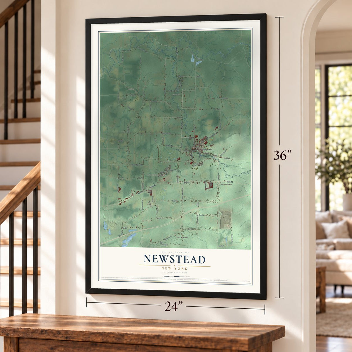 Newstead, New York map, 24 x 36 inch print in a black frame by a staircase