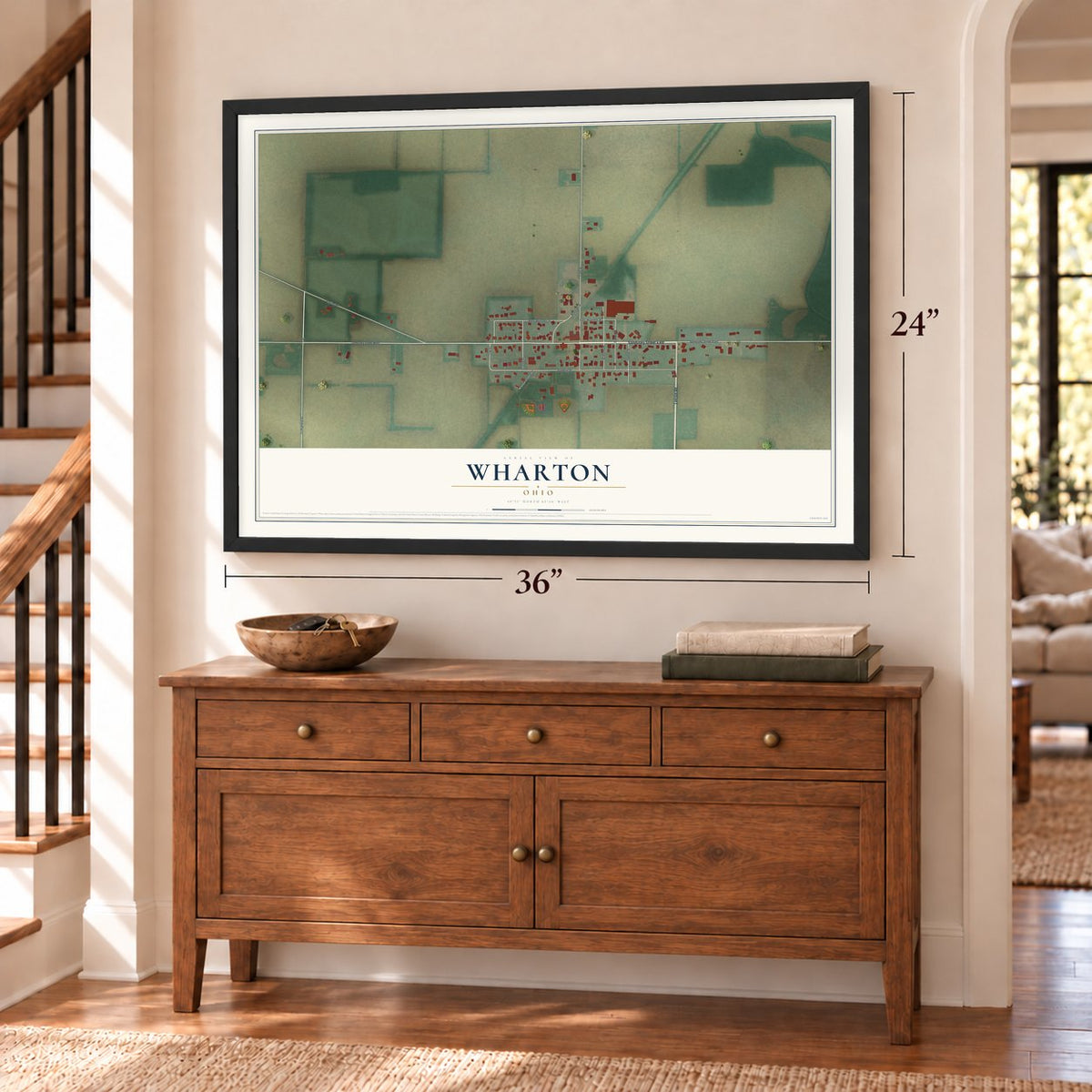 Wharton, Ohio map, 24 x 36 inch print in a black frame above a dresser by a staircase