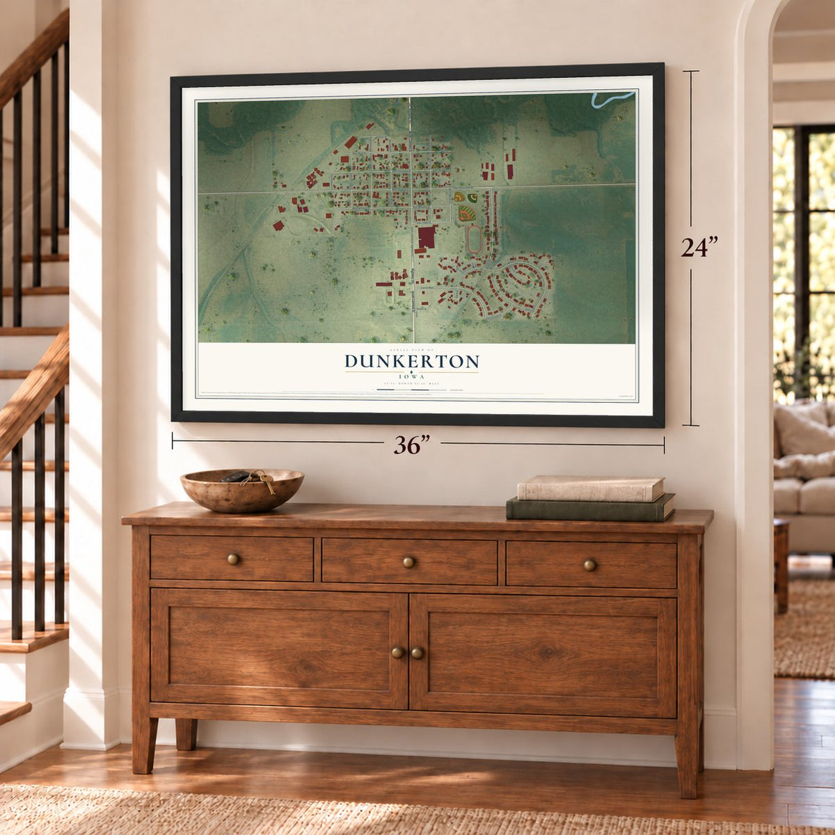 Dunkerton, Iowa map, 24 x 36 inch print in a black frame above a dresser by a staircase