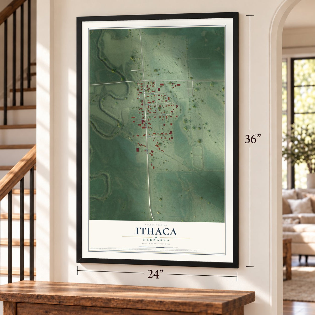 Ithaca, Nebraska map, 24 x 36 inch print in a black frame by a staircase