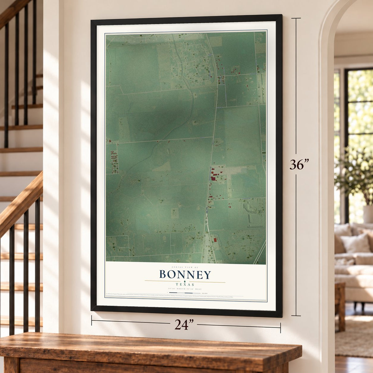 Bonney, Texas map, 24 x 36 inch print in a black frame by a staircase