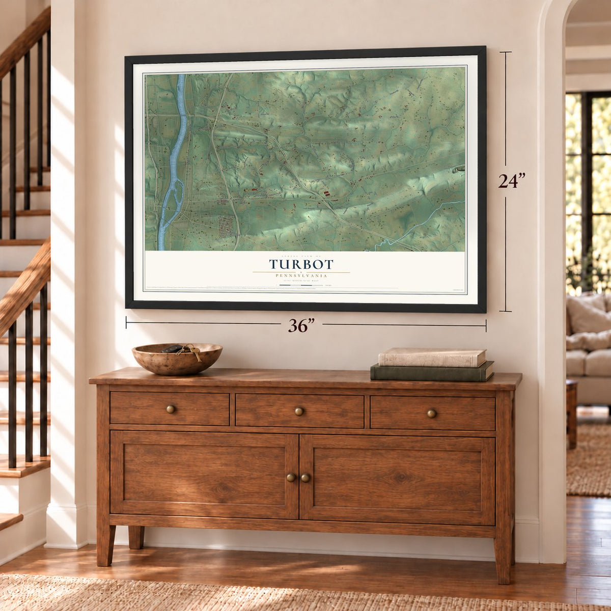 Turbot, Pennsylvania map, 24 x 36 inch print in a black frame above a dresser by a staircase