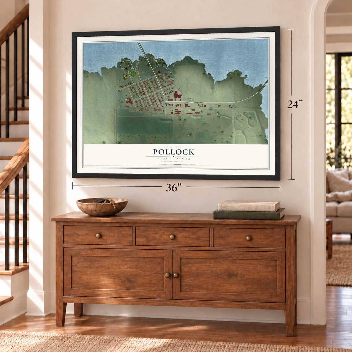 Pollock, South Dakota map, 24 x 36 inch print in a black frame above a dresser by a staircase