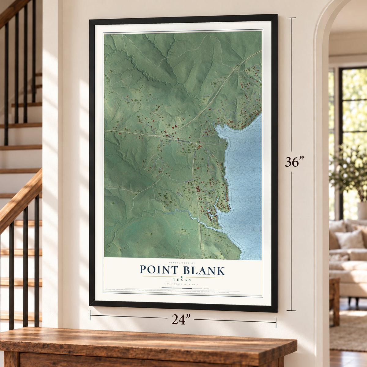 Point Blank, Texas map, 24 x 36 inch print in a black frame by a staircase