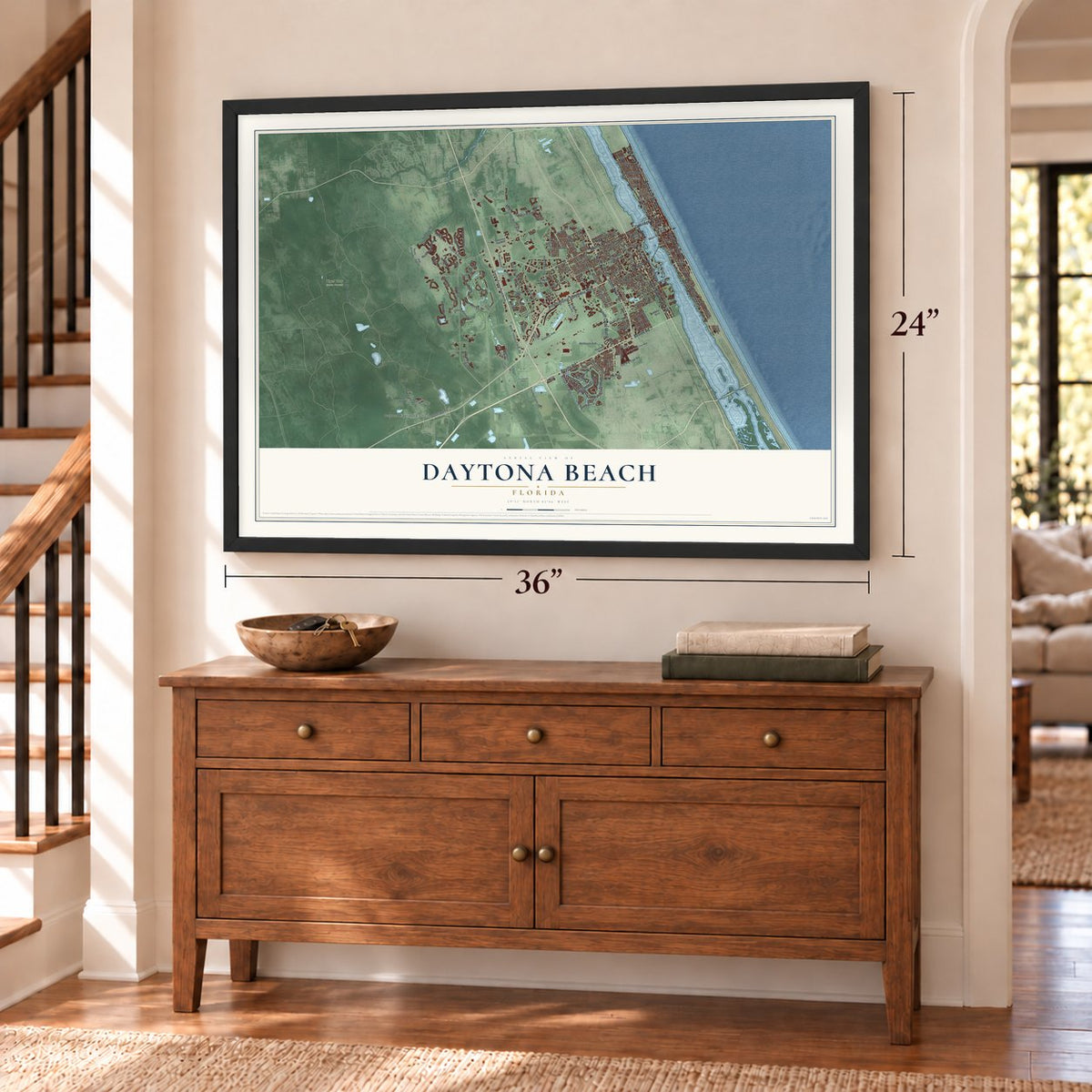 Daytona Beach, Florida map, 24 x 36 inch print in a black frame above a dresser by a staircase