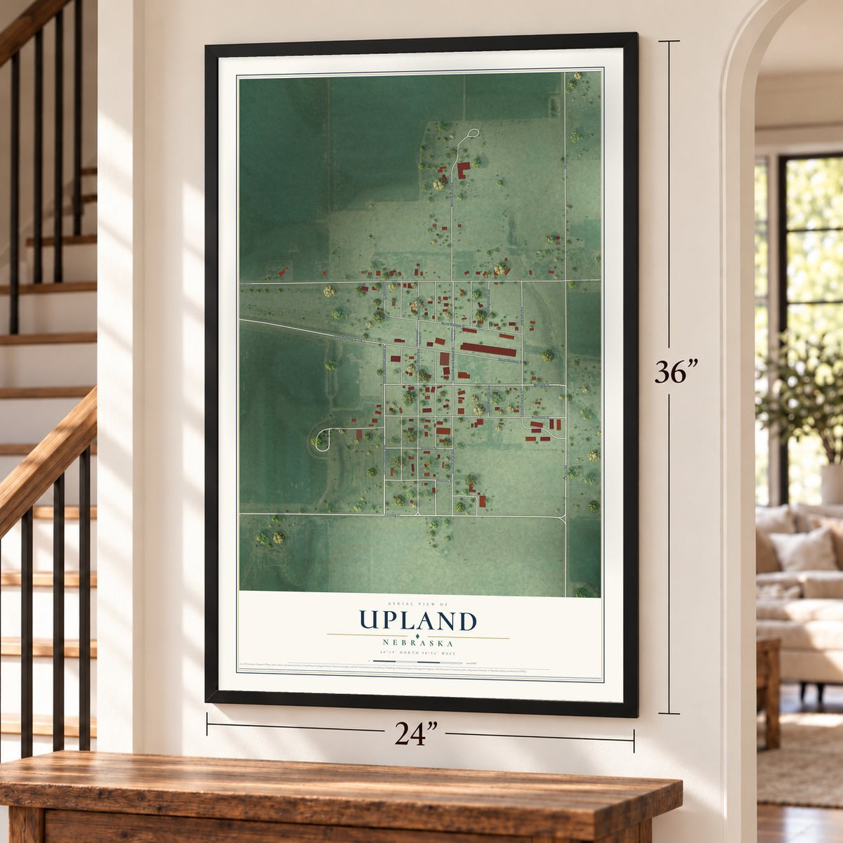 Upland, Nebraska map, 24 x 36 inch print in a black frame by a staircase