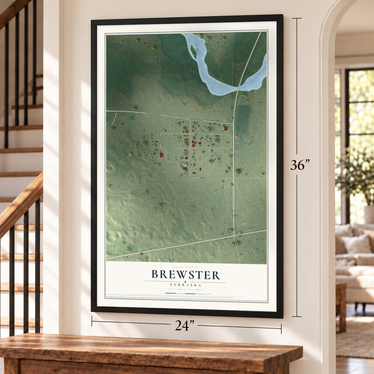 Brewster, Nebraska map, 24 x 36 inch print in a black frame by a staircase