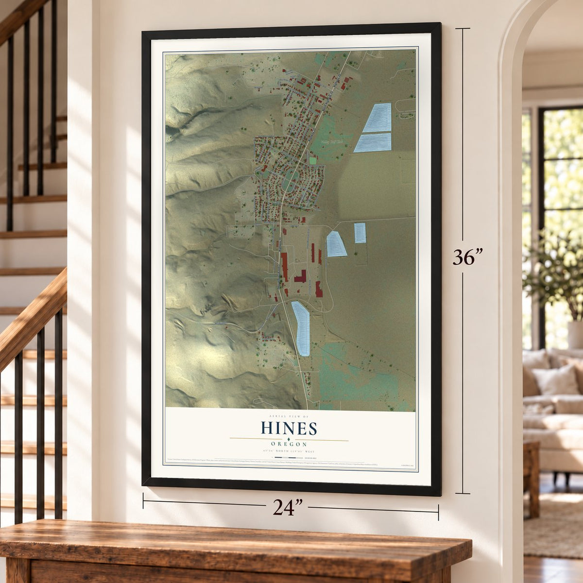 Hines, Oregon map, 24 x 36 inch print in a black frame by a staircase