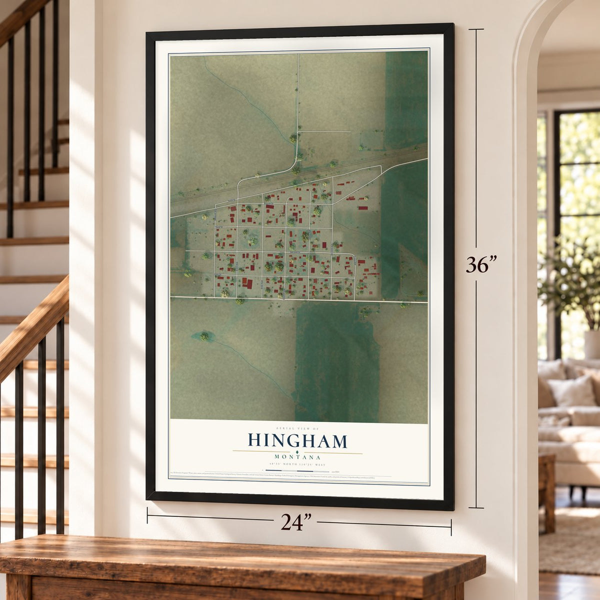 Hingham, Montana map, 24 x 36 inch print in a black frame by a staircase