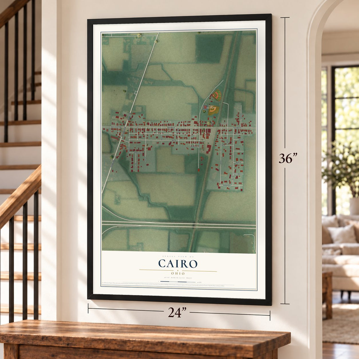 Cairo, Ohio map, 24 x 36 inch print in a black frame by a staircase