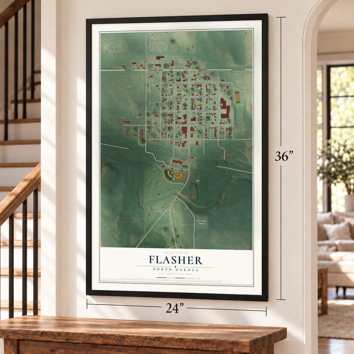 Flasher, North Dakota map, 24 x 36 inch print in a black frame by a staircase