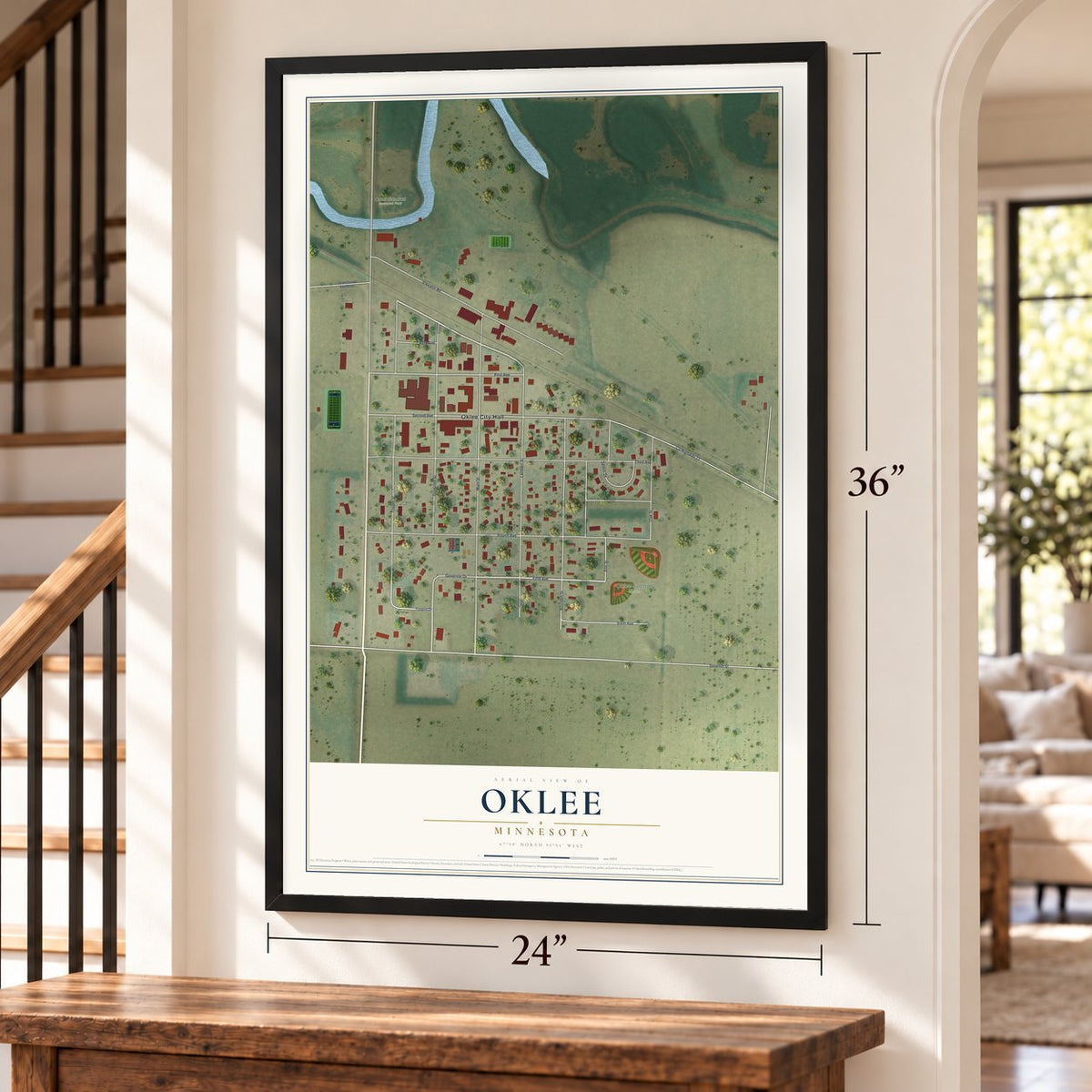 Oklee, Minnesota map, 24 x 36 inch print in a black frame by a staircase