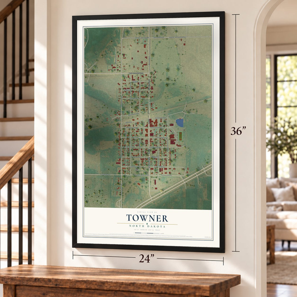 Towner, North Dakota map, 24 x 36 inch print in a black frame by a staircase