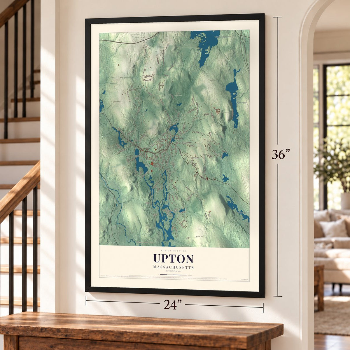 Upton, Massachusetts map, 24 x 36 inch print in a black frame by a staircase