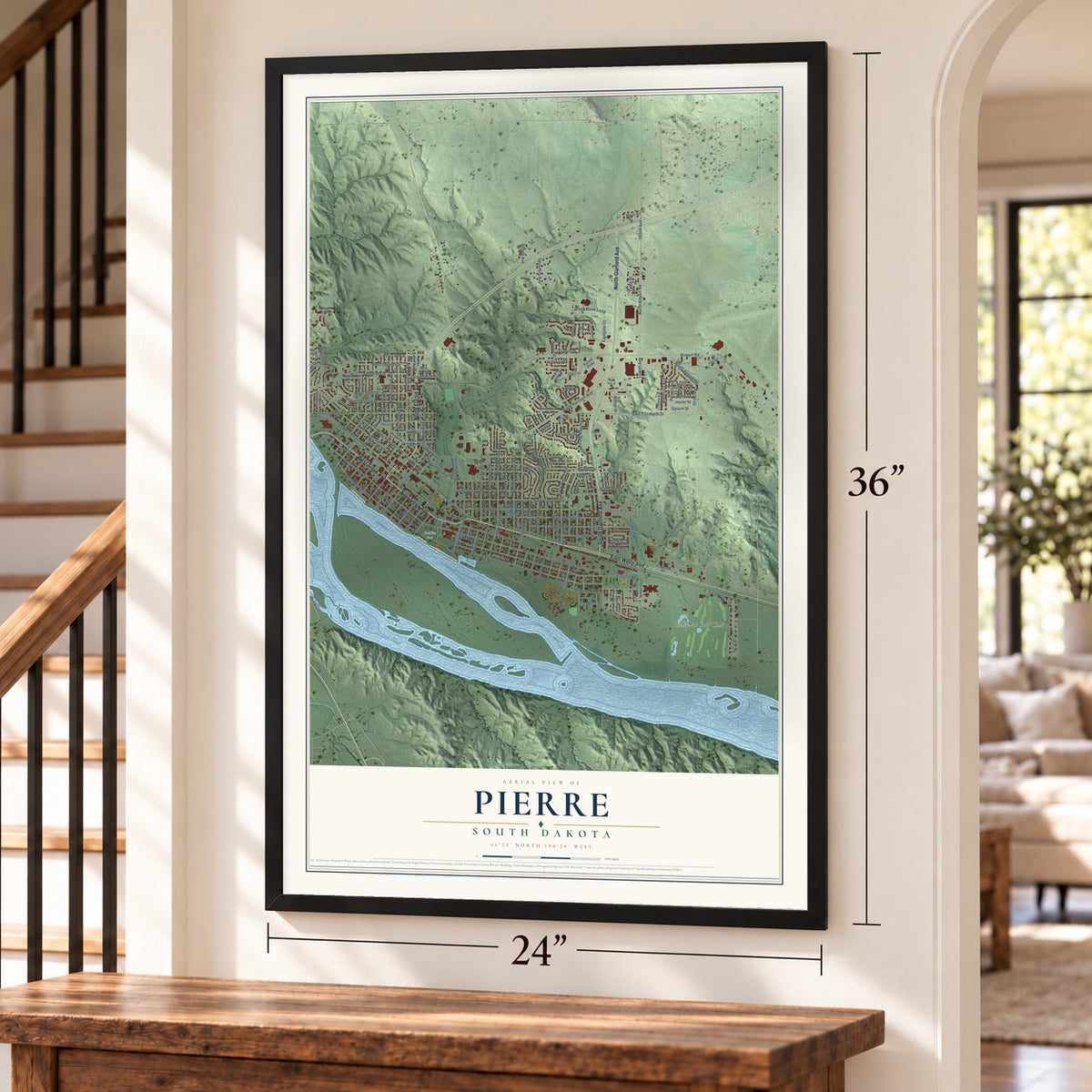 Pierre, South Dakota map, 24 x 36 inch print in a black frame by a staircase