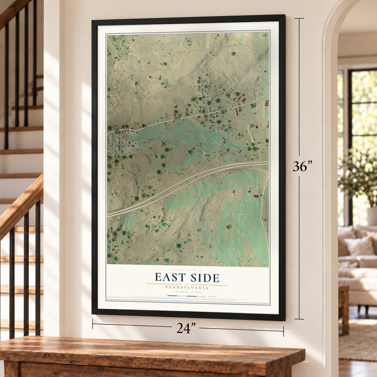 East Side, Pennsylvania map, 24 x 36 inch print in a black frame by a staircase