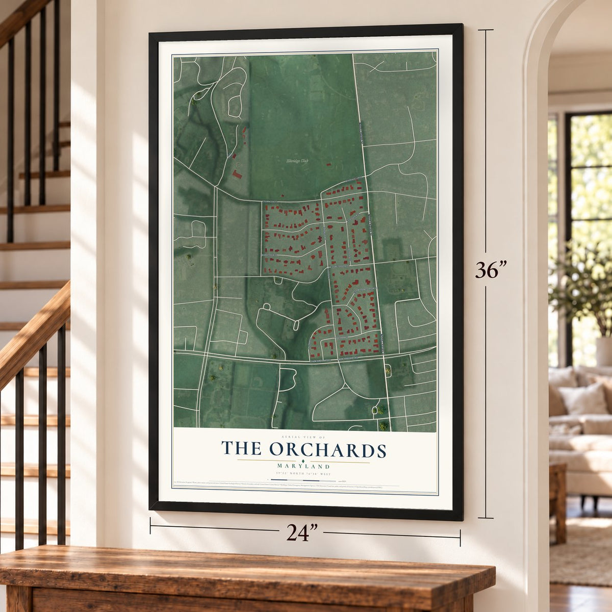 The Orchards, Maryland map, 24 x 36 inch print in a black frame by a staircase