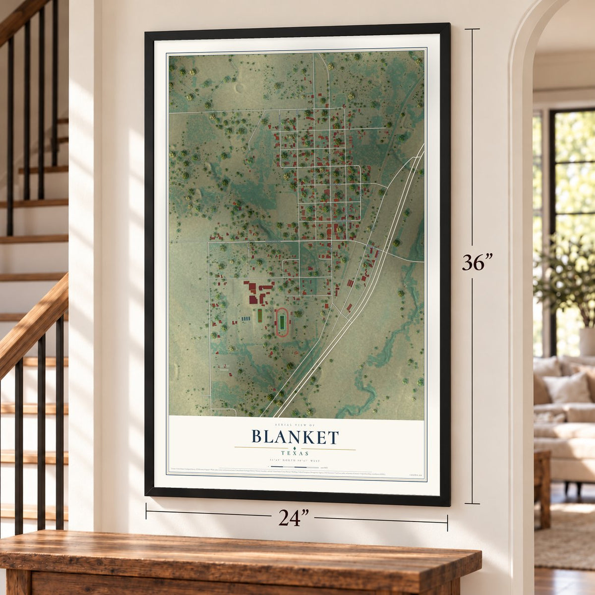 Blanket, Texas map, 24 x 36 inch print in a black frame by a staircase