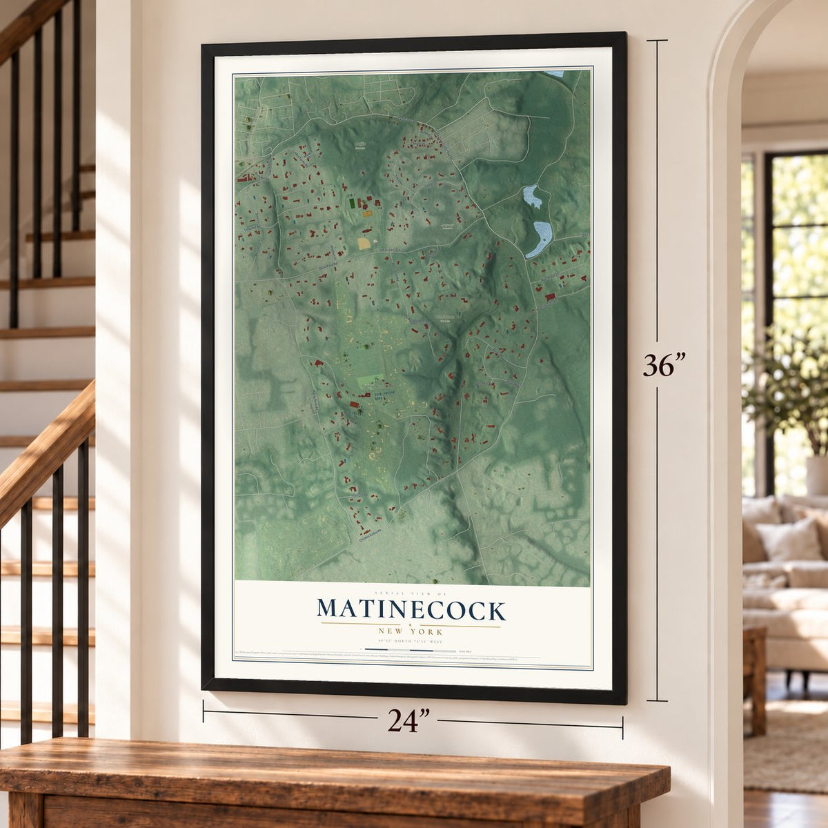 Matinecock, New York map, 24 x 36 inch print in a black frame by a staircase