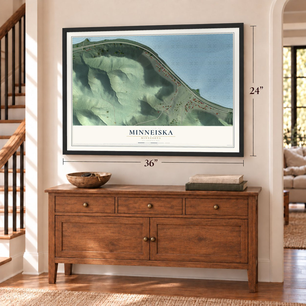 Minneiska, Minnesota map, 24 x 36 inch print in a black frame above a dresser by a staircase