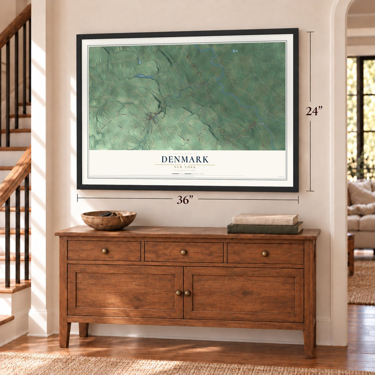 Denmark, New York map, 24 x 36 inch print in a black frame above a dresser by a staircase