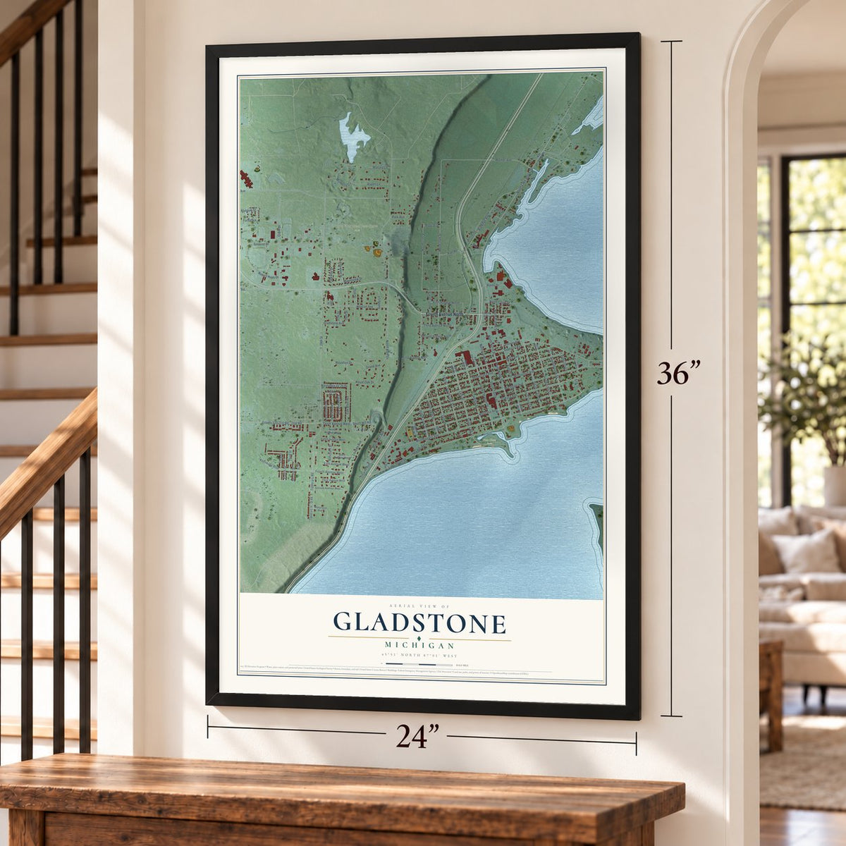Gladstone, Michigan map, 24 x 36 inch print in a black frame by a staircase