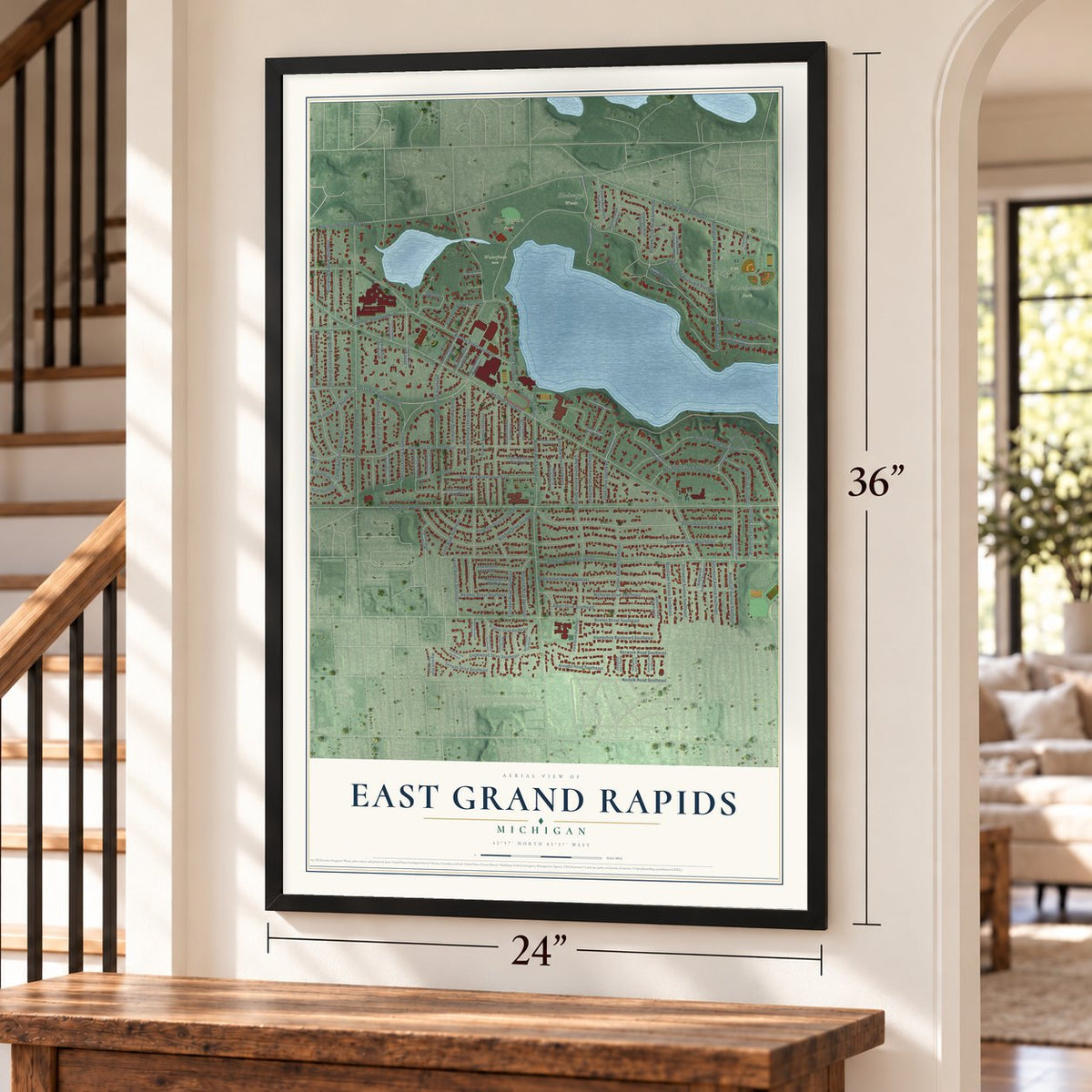 East Grand Rapids, Michigan map, 24 x 36 inch print in a black frame by a staircase