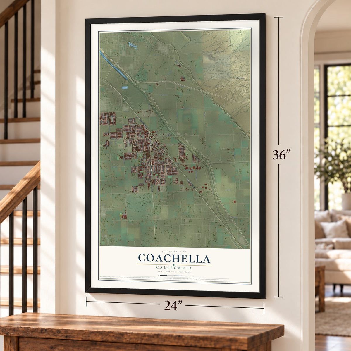 Coachella, California map, 24 x 36 inch print in a black frame by a staircase