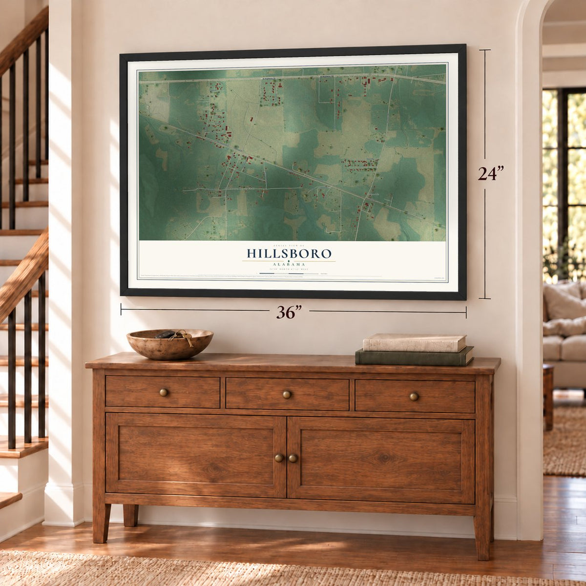 Hillsboro, Alabama map, 24 x 36 inch print in a black frame above a dresser by a staircase