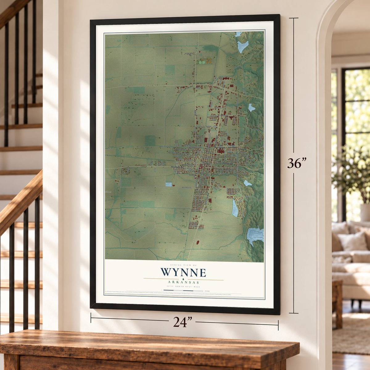 Wynne, Arkansas map, 24 x 36 inch print in a black frame by a staircase