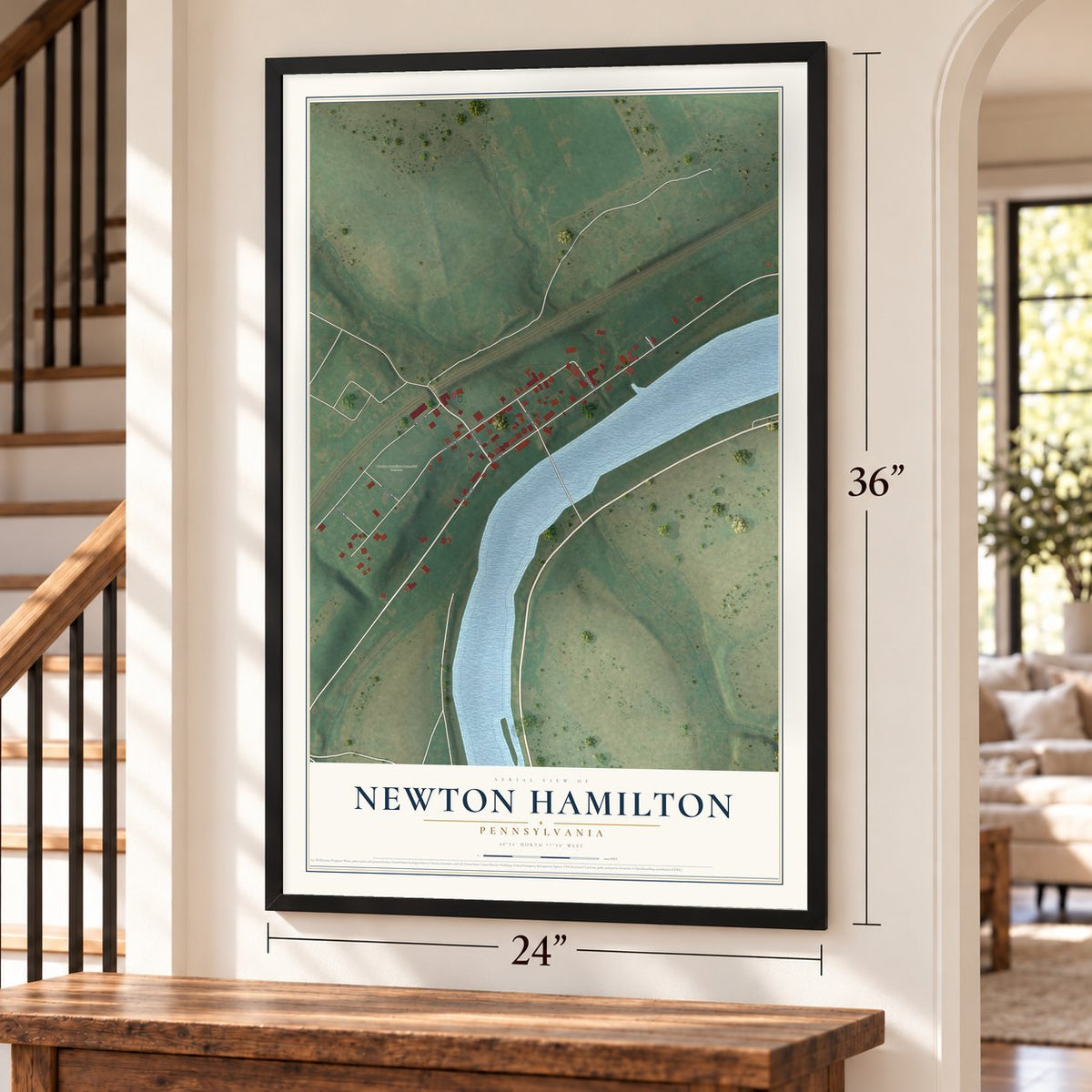 Newton Hamilton, Pennsylvania map, 24 x 36 inch print in a black frame by a staircase