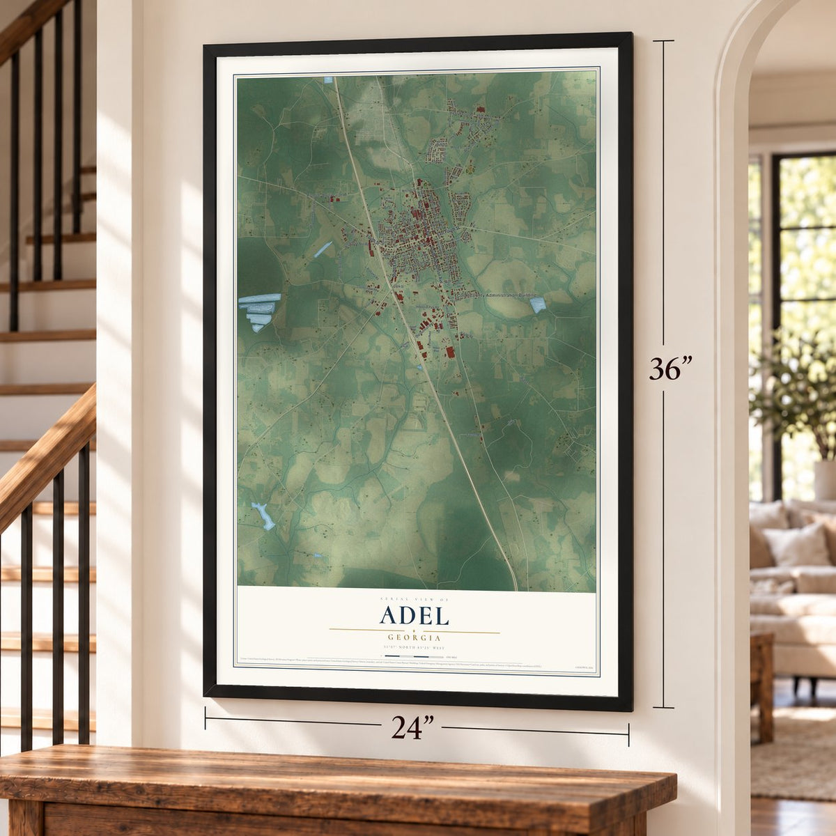 Adel, Georgia map, 24 x 36 inch print in a black frame by a staircase