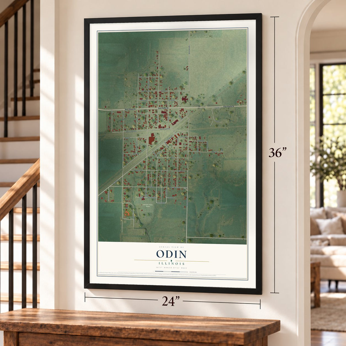 Odin, Illinois map, 24 x 36 inch print in a black frame by a staircase