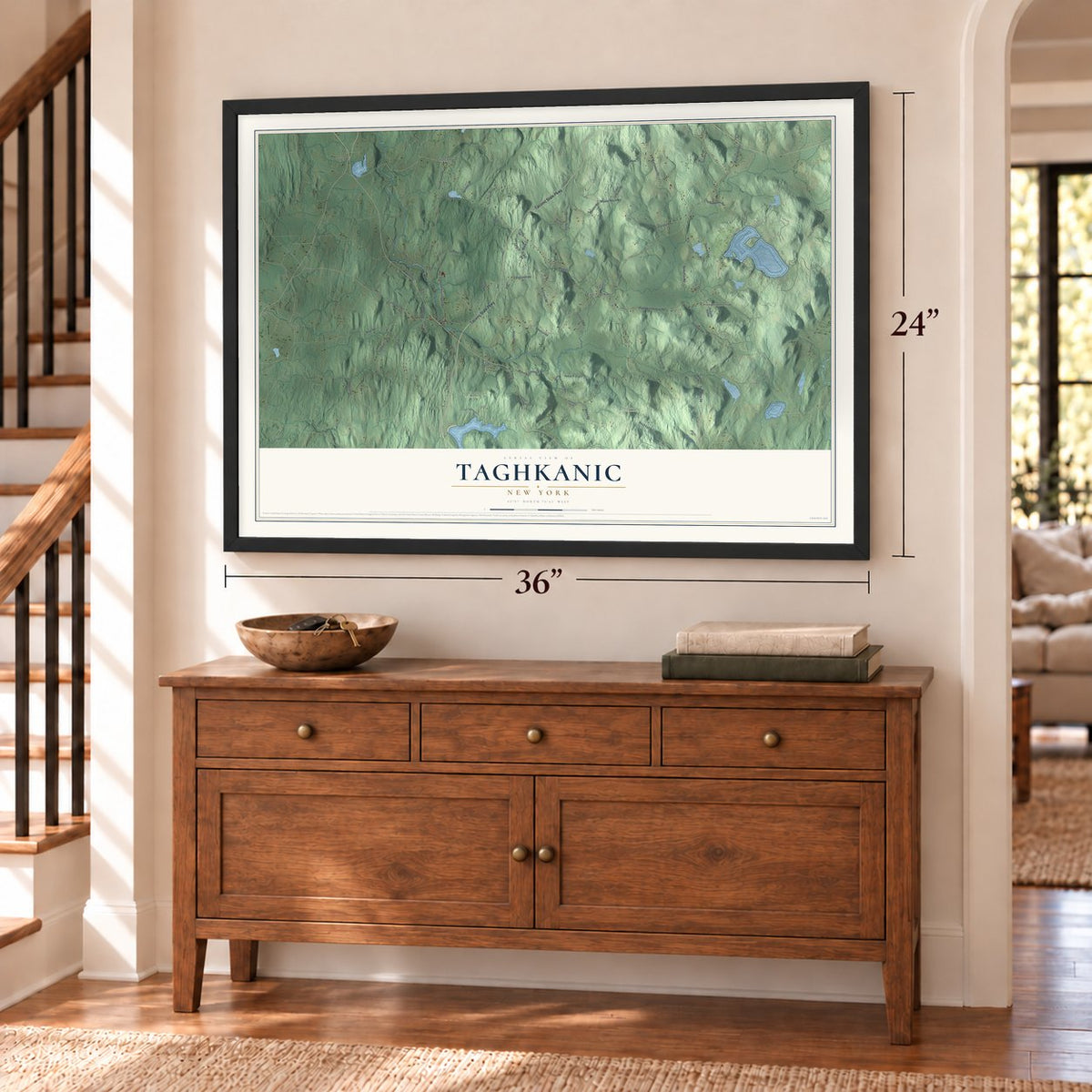 Taghkanic, New York map, 24 x 36 inch print in a black frame above a dresser by a staircase