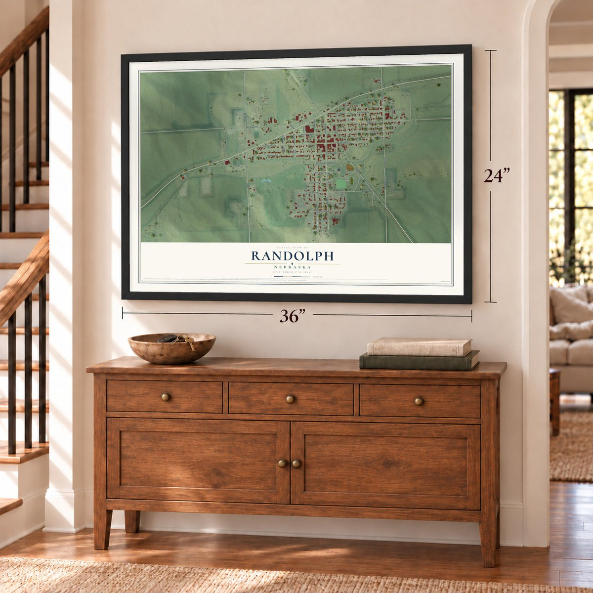 Randolph, Nebraska map, 24 x 36 inch print in a black frame above a dresser by a staircase