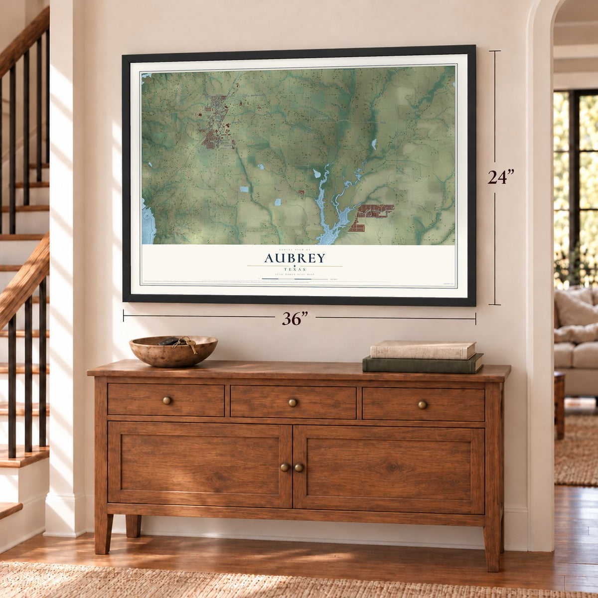 Aubrey, Texas map, 24 x 36 inch print in a black frame above a dresser by a staircase
