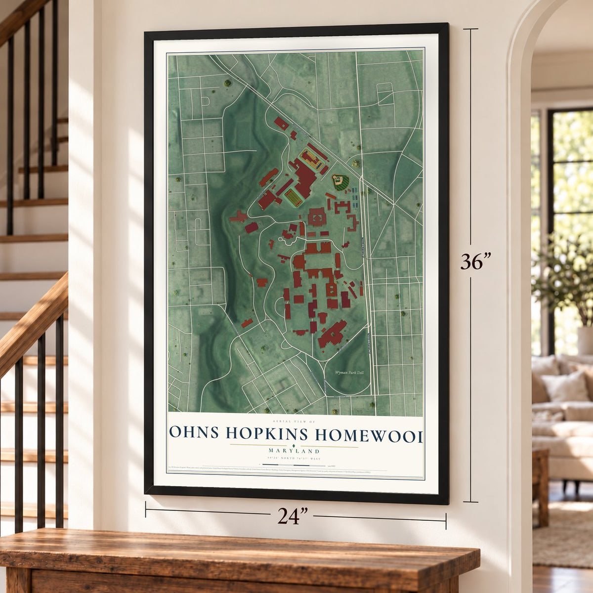 Johns Hopkins Homewood, Maryland map, 24 x 36 inch print in a black frame by a staircase
