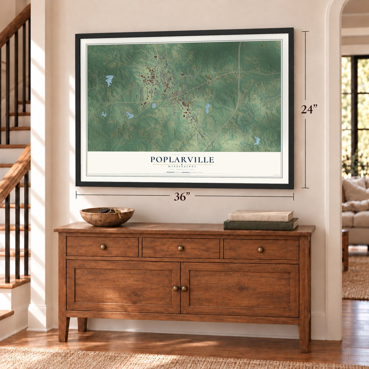 Poplarville, Mississippi map, 24 x 36 inch print in a black frame above a dresser by a staircase