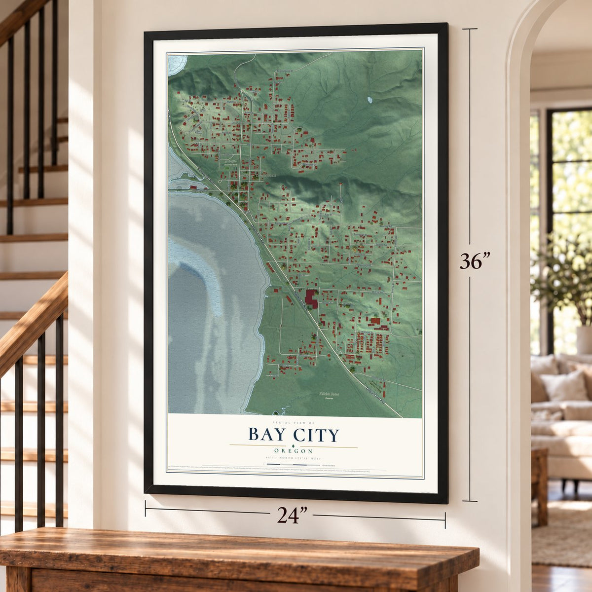 Bay City, Oregon map, 24 x 36 inch print in a black frame by a staircase