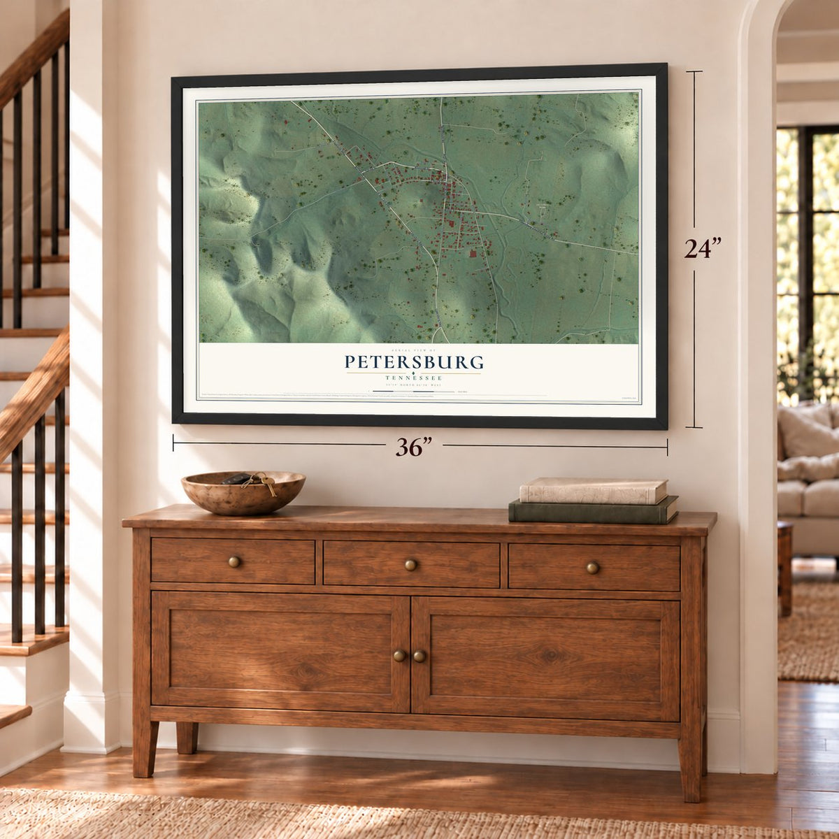Petersburg, Tennessee map, 24 x 36 inch print in a black frame above a dresser by a staircase